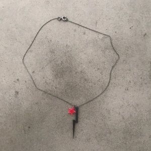 Pink star and black lightning bolt necklace